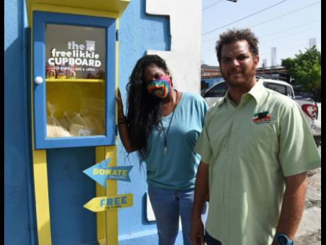 Credit: Ian Allen De-Andrea Jackson and Kyle Reynolds started The Free Likkle Cupboard
last year to help
people who
are in need
of food.