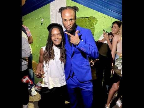 Dancehall artiste Kyodi (right) with Grammy-winning reggae star Koffee.