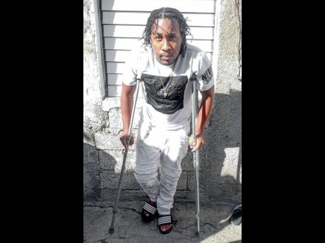  Peanut Cline, who is currently recovering from a hit-and-run, tries to stand up with the help of crutches. 