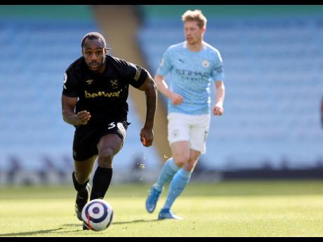 West Ham’s Michail Antonio (left) in action against Manchester City in the English Premier League on Saturday, February 27, 2021. 
