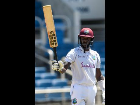 West Indies batsman Jermaine Blackwood celebrates his half century against Pakistan at Sabina Park yesterday.