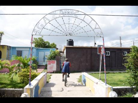 Residents of Gaza in Waterford, Portmore, St Catherine say they are unconvinced that Vybz Kartel has taken the COVID vaccine.