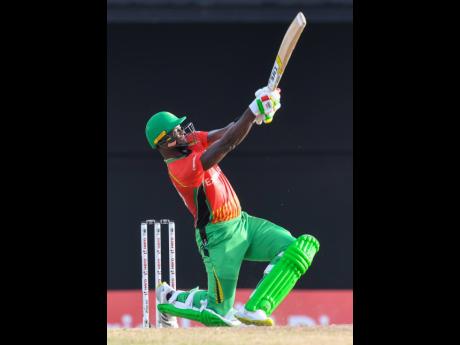 Photo by Randy Brooks - CPL T20/Getty Images

Romario Shepherd of Guyana Amazon Warriors hits a six during the 2021 Hero Caribbean Premier League match 29 between Guyana Amazon Warriors and Jamaica Tallawahs at Warner Park Sporting Complex on Sunday in Basseterre, St Kitts, Saint Kitts and Nevis. 