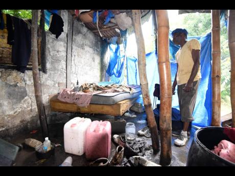 Alton Bogle’s house is in a state of disrepair.