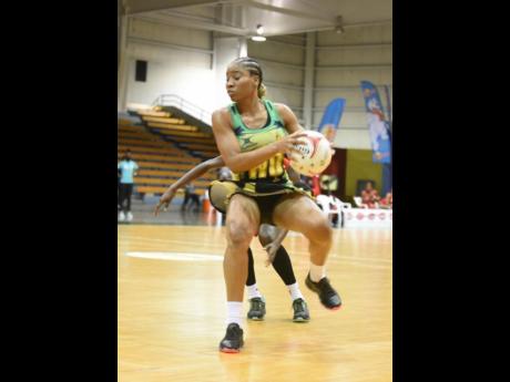 Credit: Kenyon Hemans Sunshine Girl Shadian Hemmings in action against Trinidad and Tobago during the first match of the Sunshine Series at the National Indoor Sports Centre last Saturday.