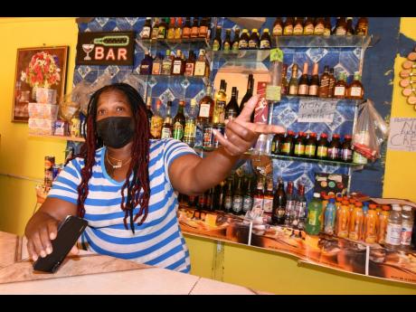 Credit: Kenyon Hemans Cocoa Ridge resident Georgia Burrell laments the impact of poor Internet service in the community as well as slow sales at her bar, due to the COVID-19 pandemic.