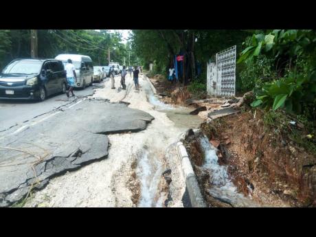 Sections of the Unity Hall to Guava Walk main road in St James were destroyed by floodwaters brought by heavy rainfall between Sunday night and Monday morning.
