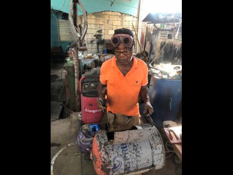 Credit: Tiffany Taylor Cecil Campbell said that he prefers making jerk pans than mufflers.