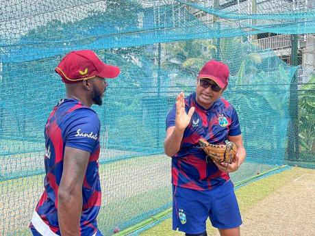 Credit: CWI photo Jermaine Blackwood (left) and batting coach Monty Desai in the nets in Sri Lanka.