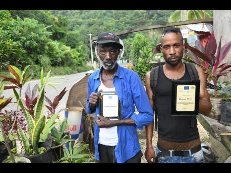  Franklyn Williams (left) and Howard Fields are some of the heroes of the Bog Walk Gorge. They have been recognised for their work in rescuing people from the dangerous Rio Cobre.