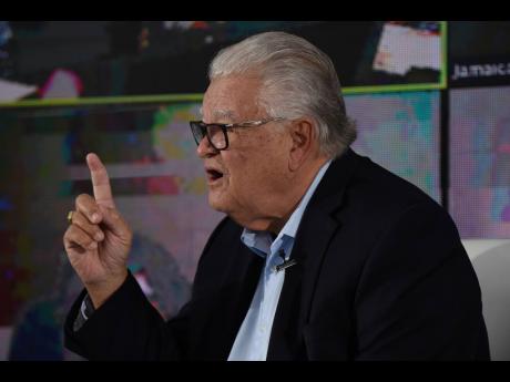 Karl Samuda, minister of labour and social security.