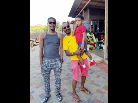 Credit: Contributed Mr Lexx (left) with his dad Uvaney Palmer (centre) and youngest son, Logan Palmer.