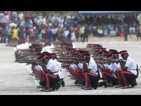 Credit: File Members of Batch 117 of the National Police College of Jamaica perform a routine during the passing out parade and awards ceremony for 293 constables held on the college grounds in Twickenham Park, St Catherine in 2018. More than 1,200 persons were recruited into the JCF last year.