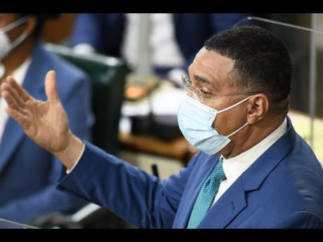 Prime Minister Andrew Holness speaking at the sitting of the House of Representatives yesterday.