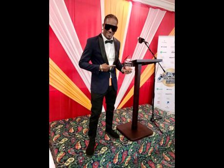 Credit: Contributed Shelly Belly shows his Street Recognition Award which he received from Hapilos for his contribution to ‘Street Culture’ in Jamaica.