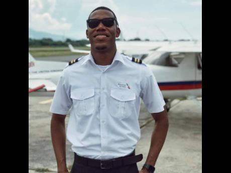 This image which first appeared on Facebook was thought by many to be sprinter Zharnel Hughes wearing an American Airlines uniform. Hughes, however, denies this, saying the photo was uploaded by an imposter.