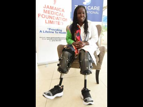 Credit: Kenyon Hemans Cara Moore is overjoyed after she was gifted new prosthetic legs during a small handing over ceremony held at Pegasus Hotel last Friday.