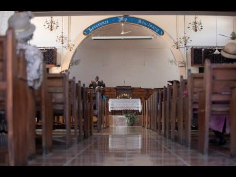 In this March 2020 photo, members of the Seventh-Day Adventist Church, North Street, Kingston, worship in the sanctuary. A judge last week ordered a minor facing a charge of simple larceny to attend church as a condition of his bail.