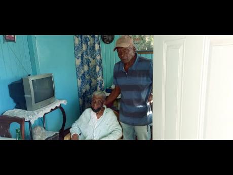 Miss Elsie and her son, Pinceton Nunez.