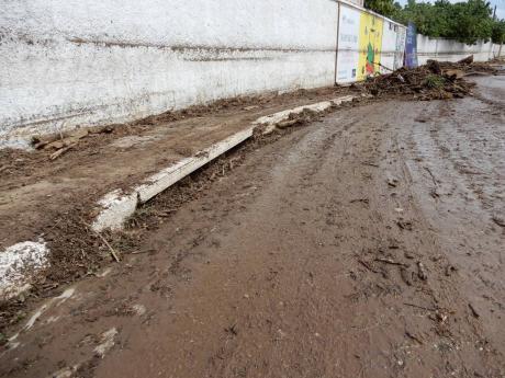 A gutter showing the small openings that have been deemed unsatisfactory and that authorities believe, after initial assessment, contributed to the flooding.