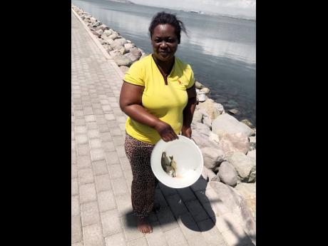 Walton shows off her catch.