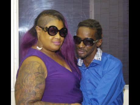 In this 2016 photo, former lovers Amari (left), and Gully Bop are seen in a loving embrace.