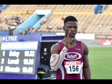 Herbert Morrison High School’s Deandre Daley wins the Under-20m Men’s 100m sprint at the Carifta Trials at the National Stadium on Saturday.