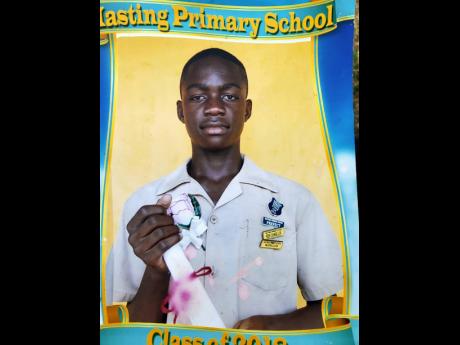 Khamal Hall, the day he graduated from Hastings Primary School.