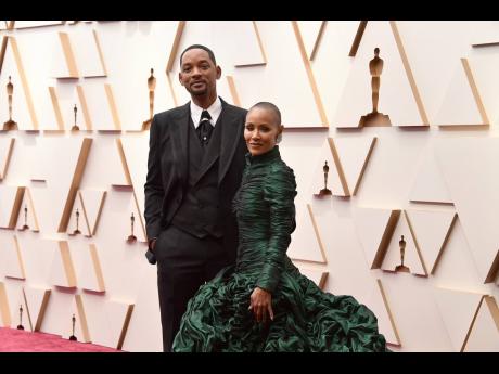 Will Smith and Jada Pinkett-Smith at the Oscars. (Photo by Jordan Strauss/Invision/AP)