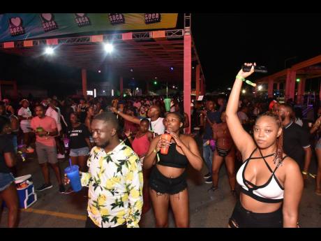 Patrons enjoying last night’s staging of I Love Soca at Port Royal Street in downtown Kingston.