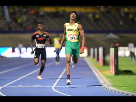 Marcinho Rose anchors Jamaica to gold in the Boys U17 4x400m relay final at the Carifta Games in Kingston on Monday night.