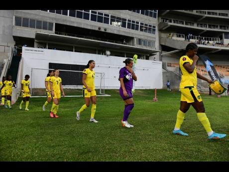 Jamaica’s Reggae Girlz take the field for their Concacaf Women’s Championship qualifier against the Dominican Republic at Sabina Park in Kingston on Tuesday, April 12.
