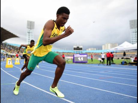 Jamaica’s J’Voughnn Blake on his way to gold in the boys U20 800m final at the Carifta Games in Kingston on Monday.