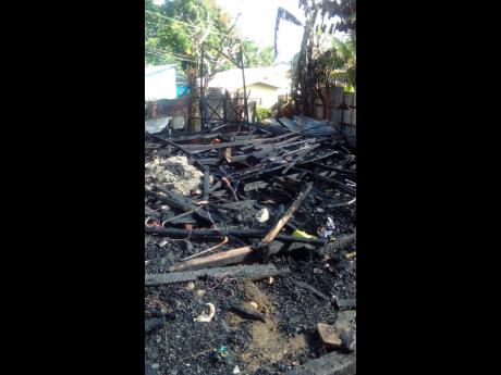 Rubble is all that’s left of Christine Richards’ home after a fire on Christmas Eve 2021.