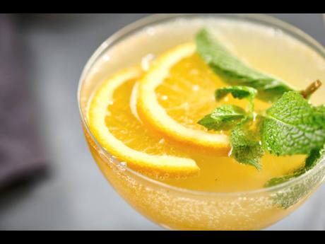 An orange champagne mule. 