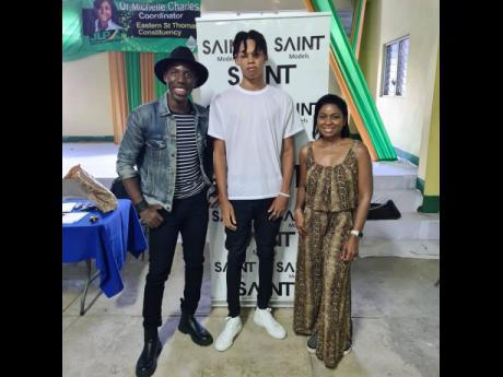 St Thomas resident Chian Seivwright (centre), one of SAINT International’s model discoveries for its community model search, with SAINT CEO Deiwght Peters (left) and St Thomas East member of parliament, Dr Michelle Charles.