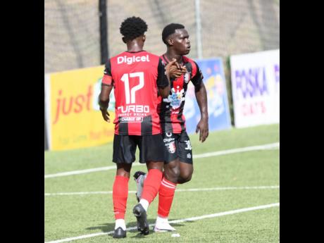 Marlon Allen (right) and Romeo Guthrie of Arnett Gardens. 