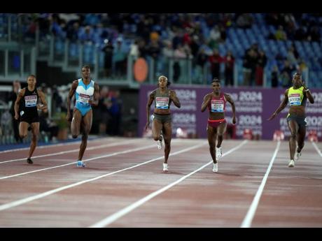 Shericka Jackson of Jamaica (right) on her way to victory in the women’s 200m competition at the Golden Gala Pietro Mennea Wanda Diamond League meeting in Rome, Italy on Thursday. Also pictured are (from left)  Allyson Felix of the United States, the Bahamas’ Shaunae Miller-Uibo, Jamaica’s Elaine Thompson Herah, and Great Britain’s Dina Asher-Smith.