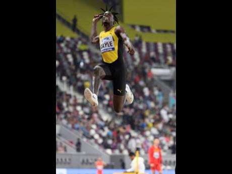 Tajay Gayle jumping for gold
at the 2019 World Championships
in Doha, Qatar.