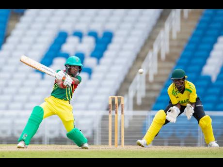Windward Islands captain Zaida James (left) plays a cut shot during her match-winning innings against Jamaica Wicketkeeper Tasha-Gaye Gordon looks on during their CWI Women’s U19 Rising Stars T20 match at the Brian Lara Cricket Academy in Tarouba, Trinidad and Tobago, yesterday.