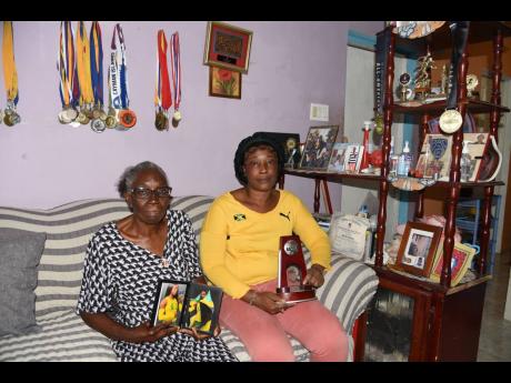 Kemba Nelson’s grandmother Verley-Ann ‘Miss Moodie’ Campbell, and her mother Sandra Campbell are beaming with pride.