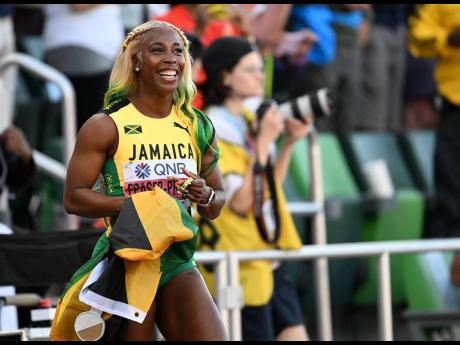 Shelly-Ann Fraser-Pryce led a Jamaican clean sweep in the 100-metres final at the IAAF World Championships last night.