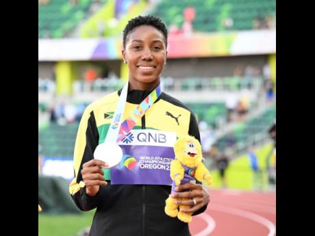 Shanieka Ricketts poses with her silver medal after the Women’s Triple Jump final at the World Athletics Championships in Eugene, Oregon, last night.