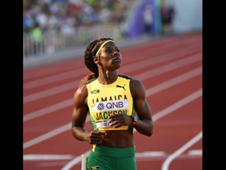 Shericka Jackson looks at the time after clocking 21.68 seconds to win her semi-final heat of the women’s 200 metres at the World Athletics Championships in Eugene, Oregon last night. 