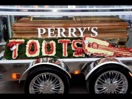 Credit: FILE The casket carrying the remains of the late Fredrick ‘Toots’ Hibbert.