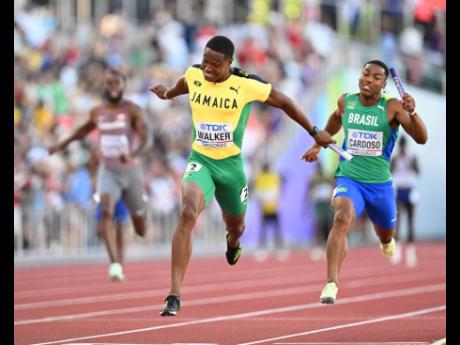 Jamaica’s Jelani Walker crossing the finish line in fourth spot in the men’s 4x100m relay final at the World Athletics Championships in Eugene, Oregon, on Saturday night.
