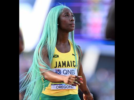 Fraser-Pryce with one of her eye-catching wigs.