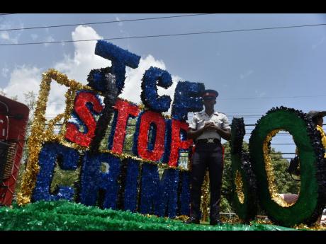 The Jamaica Constabulary Force float spreads its message loud and clear.