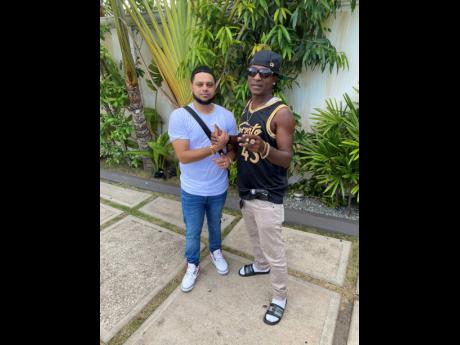 Slingerz Records director-producer Kevin Balgobin (left) and dancehall artiste Charly Black. 