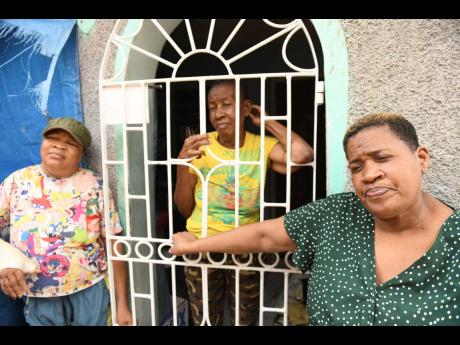 Credit: Ricardo Makyn Donna-Lee Donaldson’s grandmother Beverly Robinson (centre), and her aunts Jermadeen Lugg (left) and Ann Marie Lugg say they are leaning on their faith to get them through the ordeal.